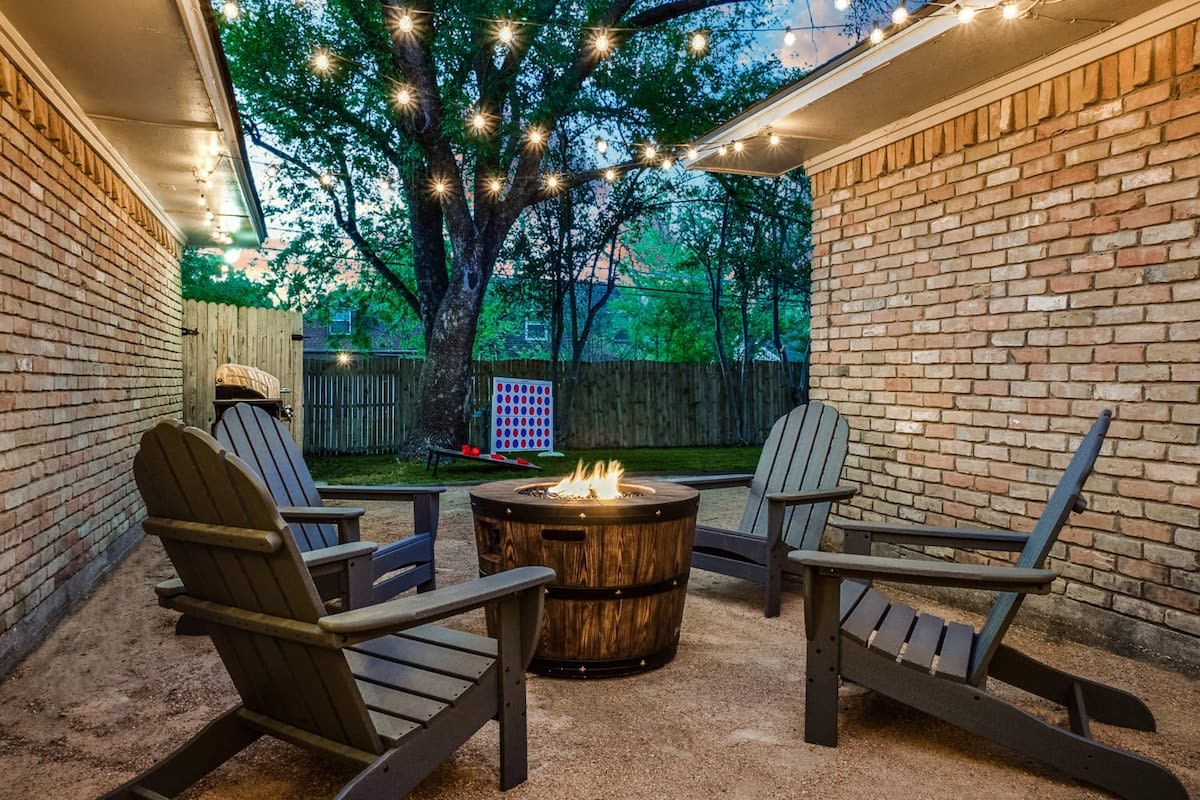 Grab a seat on one of the loungers and gather around the fire pit! The fire will keep you nice and warm while the string lights create a cozy ambiance for you to enjoy your night.