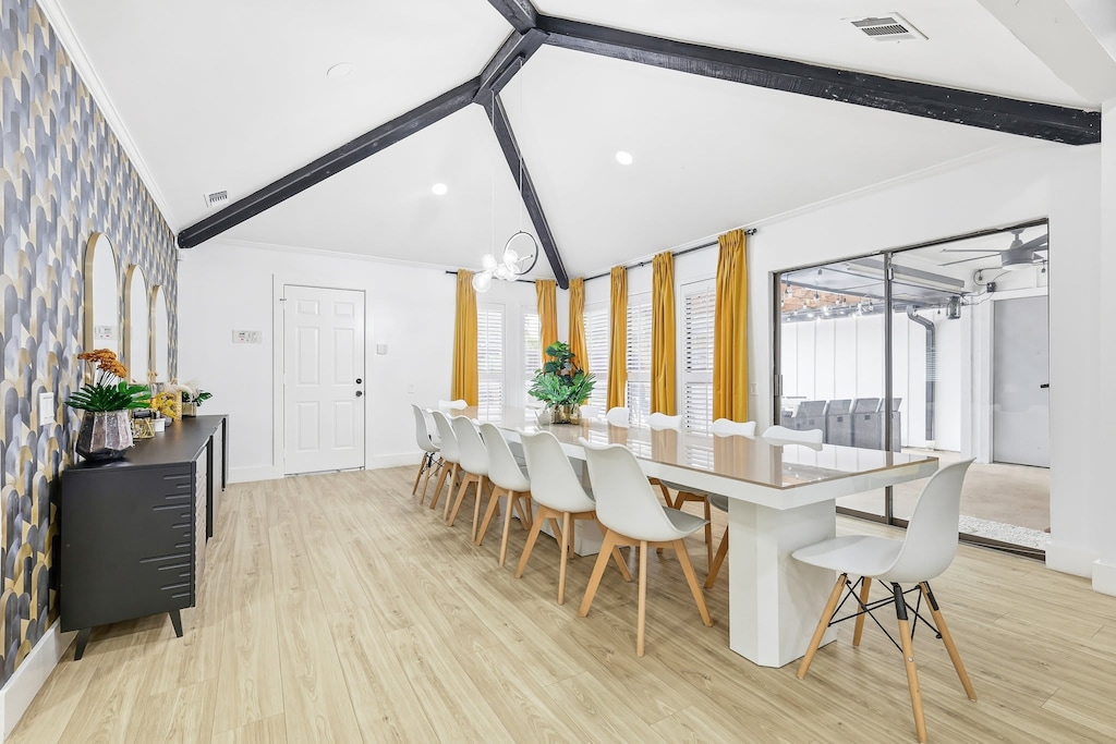 This one-of-kind dining room is sure to impress with an expansive dinner table large enough to seat at least 14 guests!