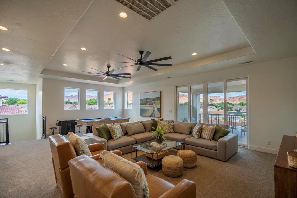 Large sofa + chair seating offer plenty of space for large groups to gather