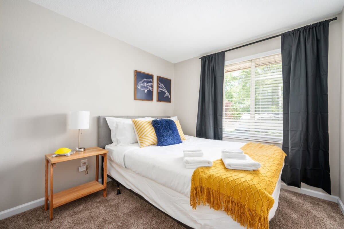 Queen Bedroom with natural lighting