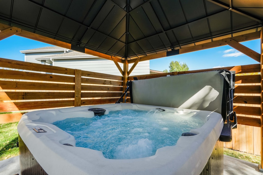 End your day in total relaxation with a soak in the private hot tub, tucked beneath a covered pergola for comfort and privacy. It’s the perfect way to recharge after mountain hikes or evenings spent around the fire pit.