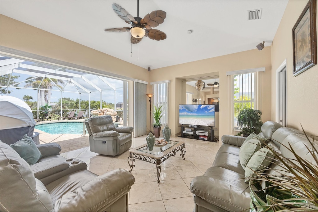 Relax on the comfortable sofas in the living room, overlooking the pool and canal