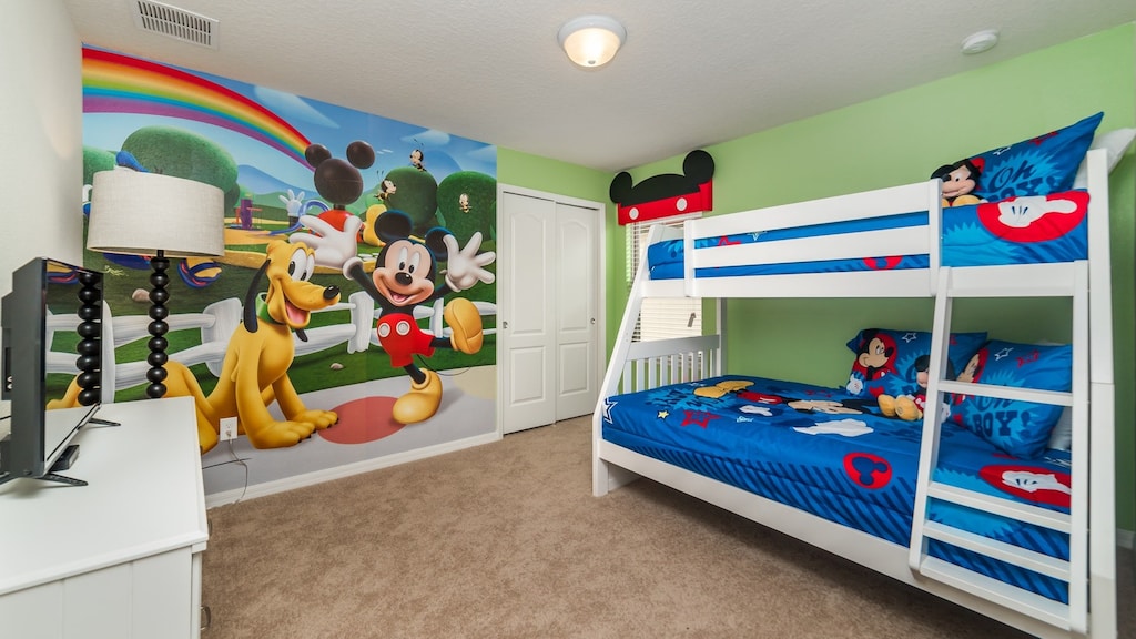 Twin/Double Bunk Bedroom 6 
Upstairs-Mickey
32" Smart TV