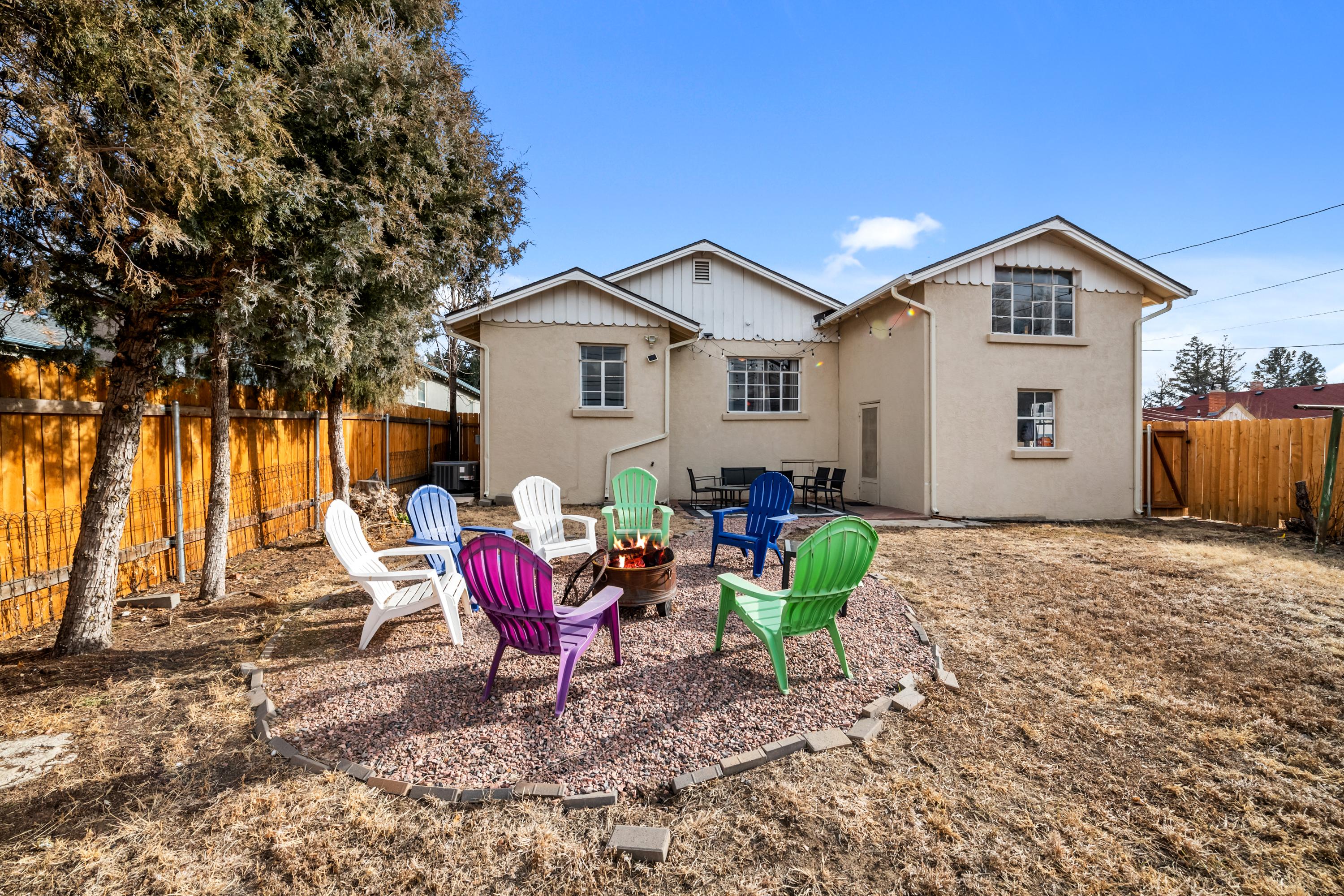 Firepit with Outdoor Seating and Fenced Yard