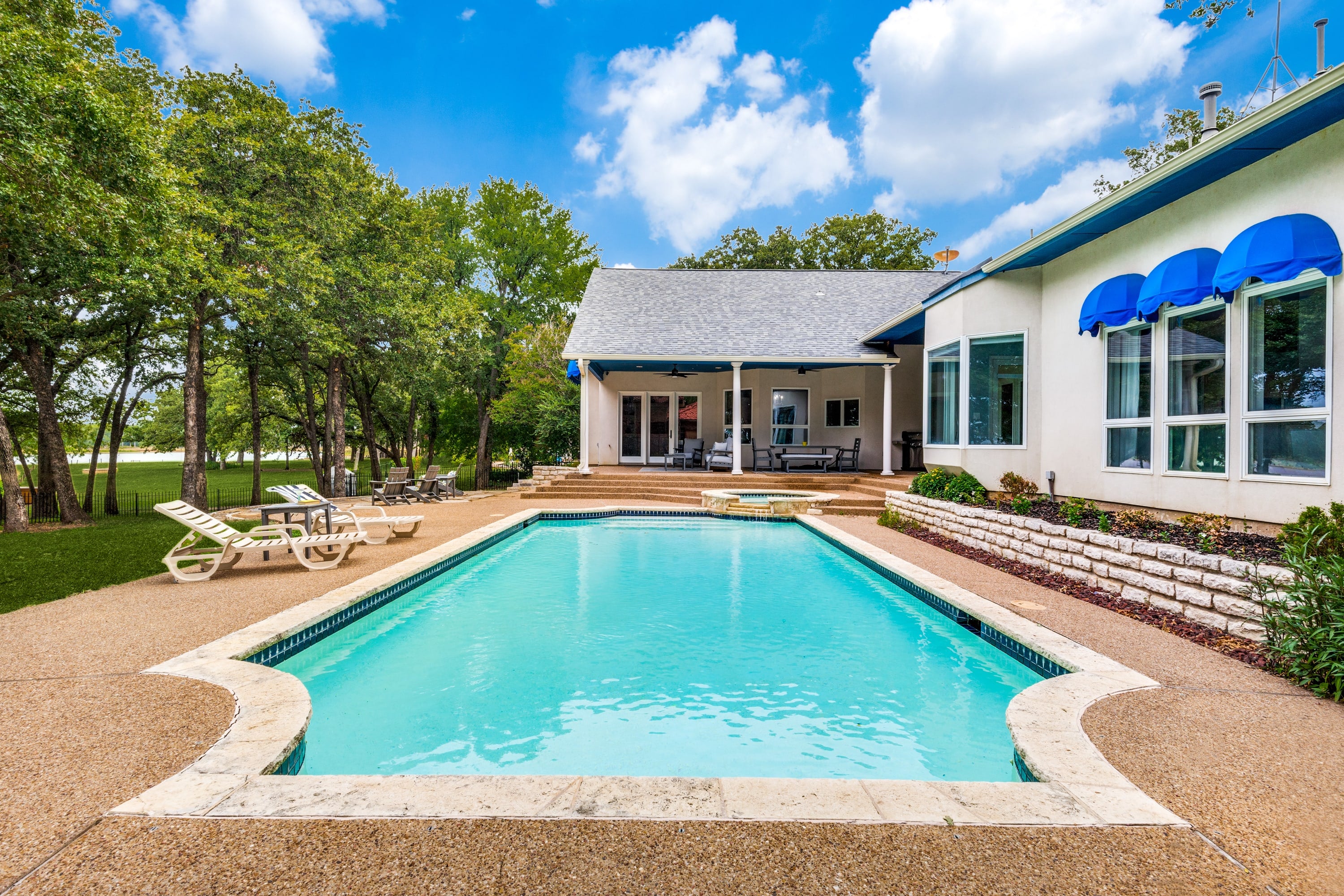 Indulge in some fun under the sun and cool off in the outdoor swimming pool, tan on the poolside loungers, and relax on the shaded patio.