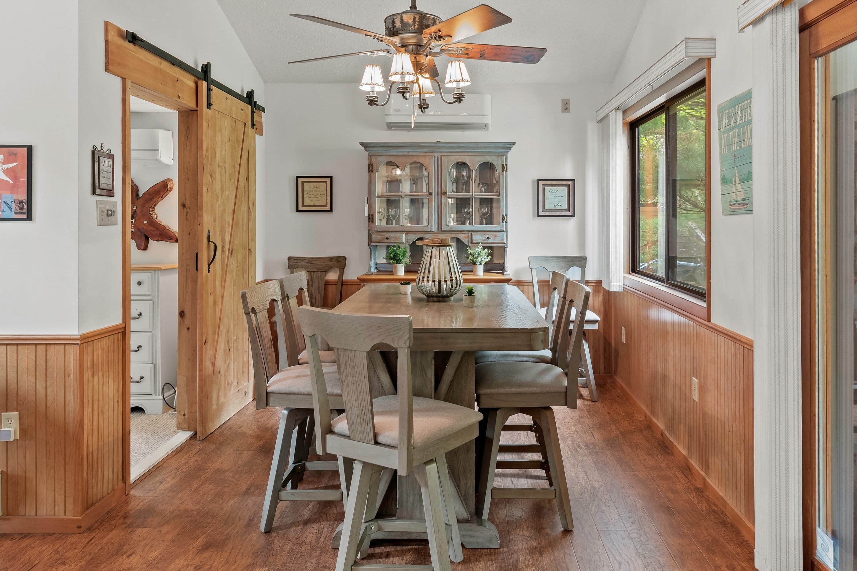 A bright and airy living space with a dining area.