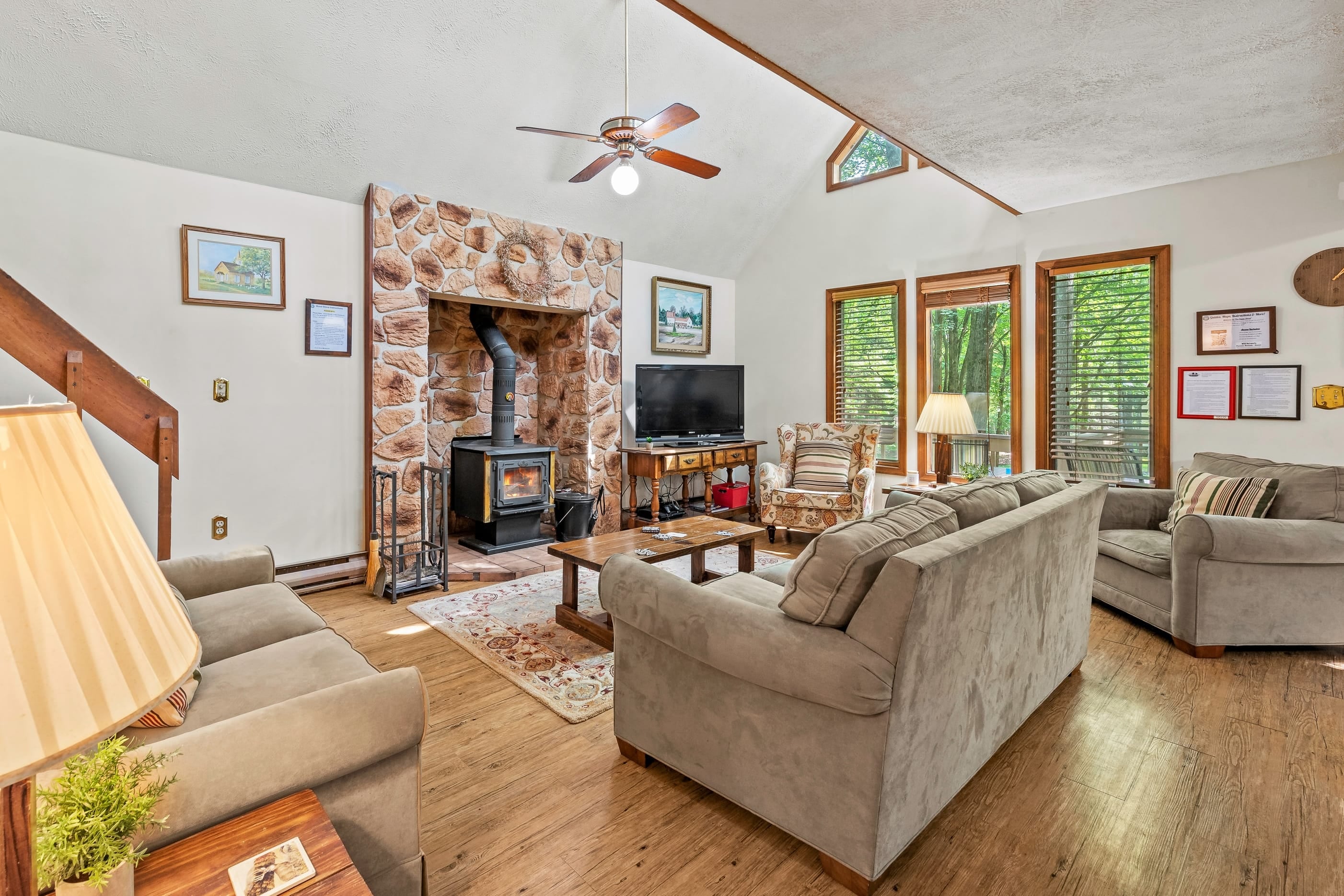 Cozy living room with a fireplace and TV.