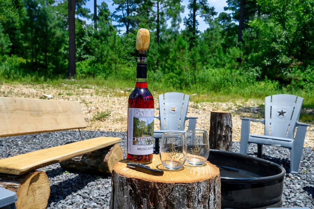 Enjoy a glass of wine while listening to the crackling fire