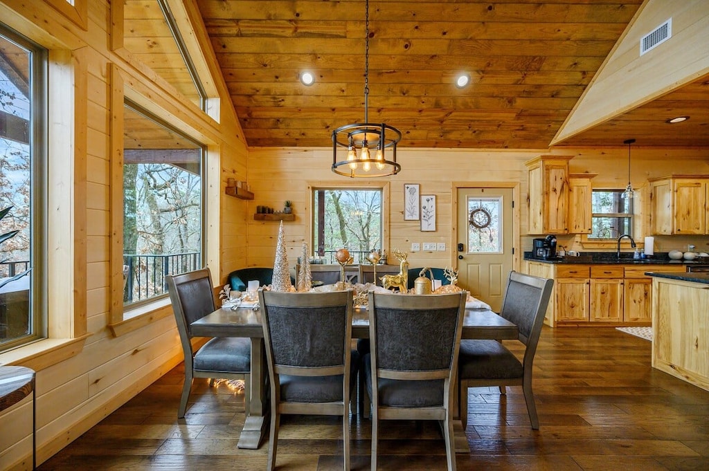 Dining table seats 6 with additional seating for 3 at breakfast bar