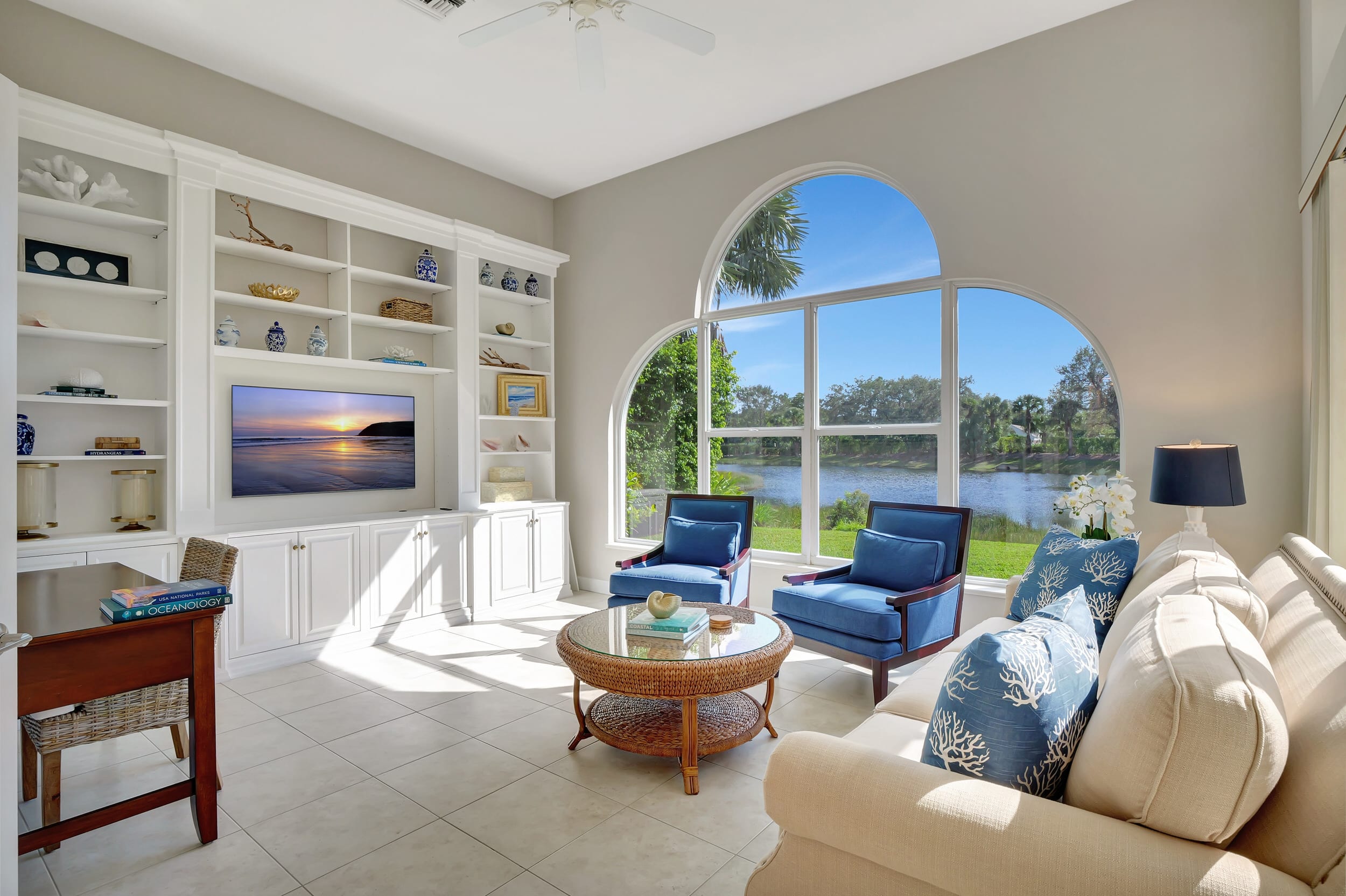 The family room has wonderful natural light along with a fantastic view of the lake