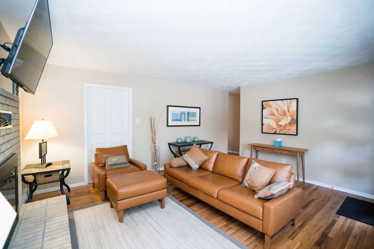 The glowing texture and warmth of the living room radiate throughout the home.