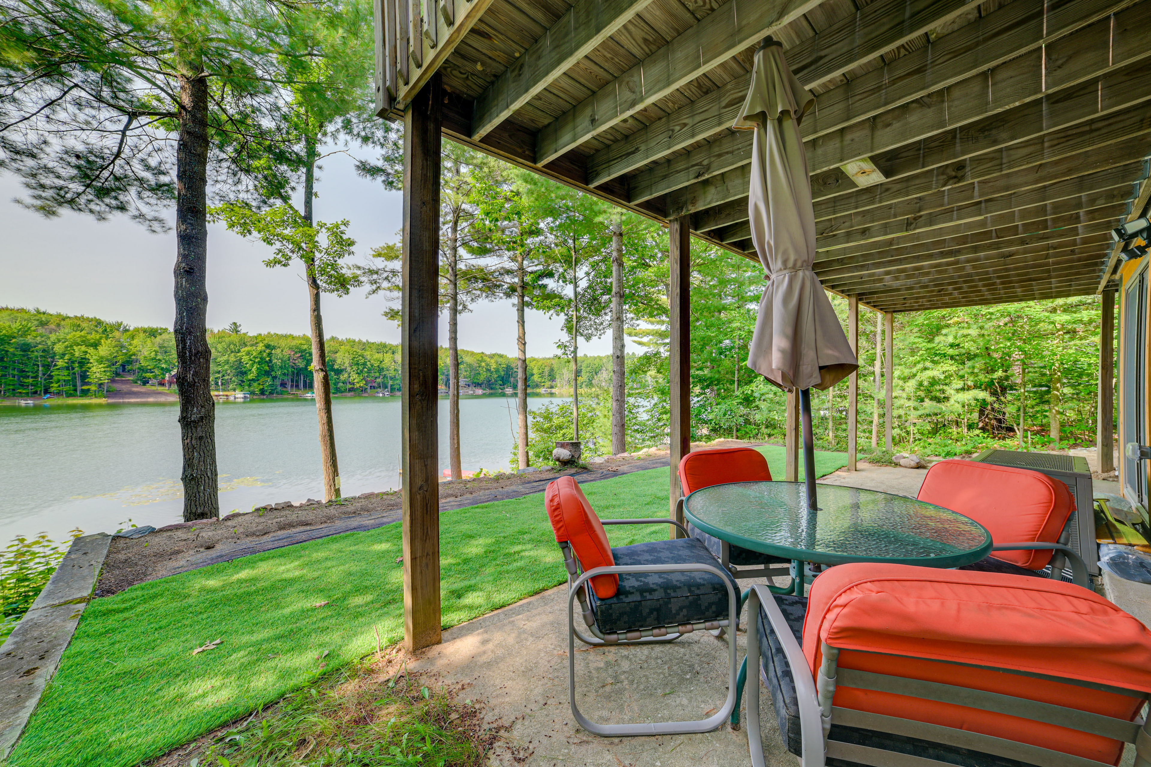 Deck & Fire Pit: Beachfront Home in Gaylord!