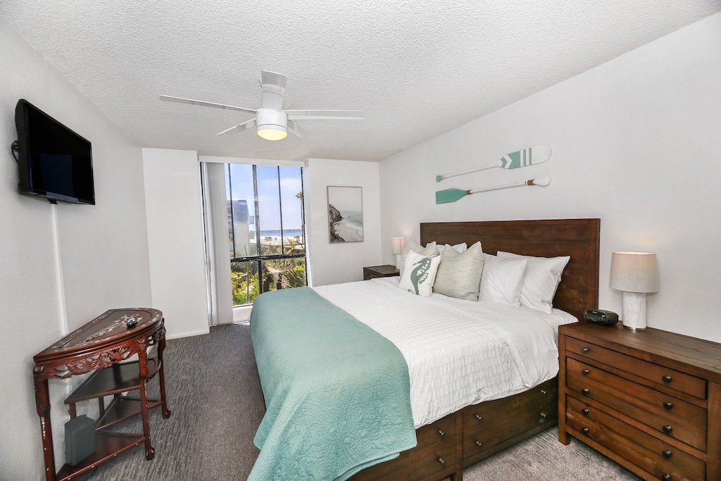 comfortable King bed with additional dresser storage drawers built in.