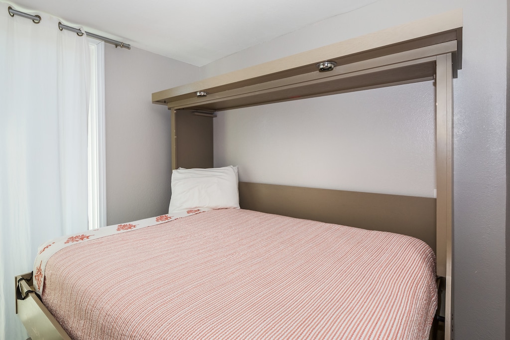 Desk is also a fold out full-size murphy bed.