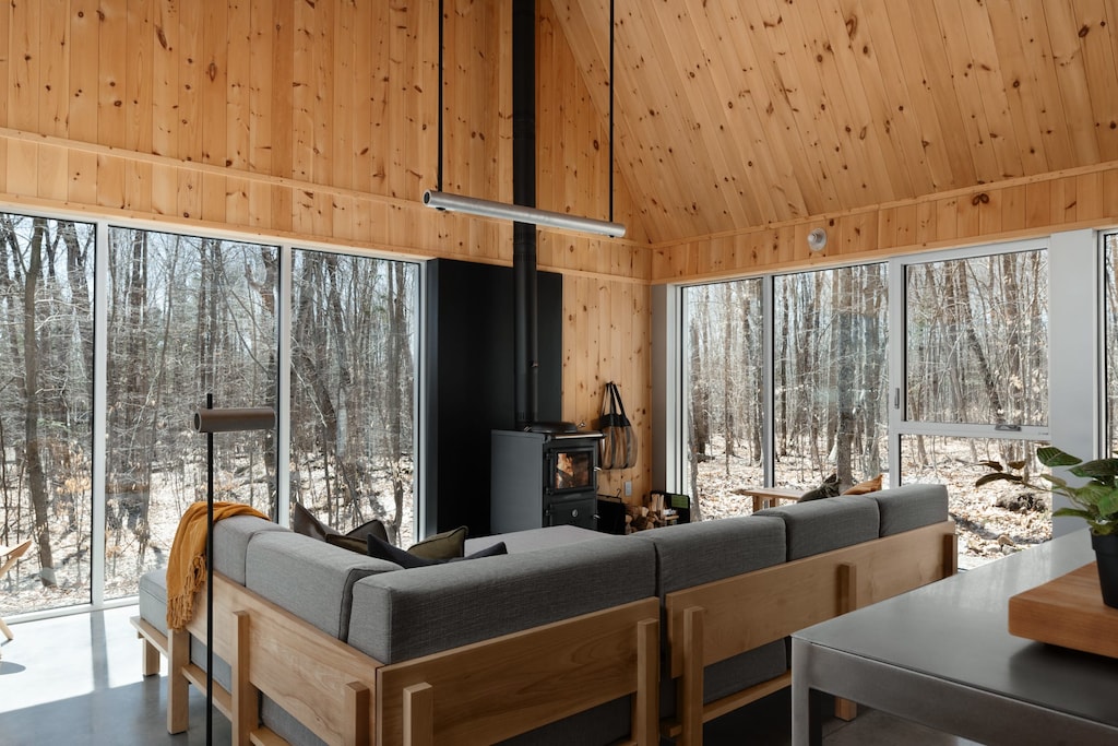 Immerse in tranquility; woodland vistas frame your natural escape.