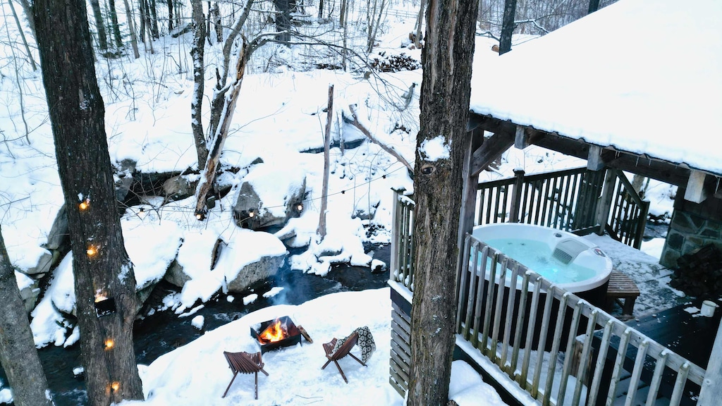 Immerse in bubbling waters, surrounded by forest calm.