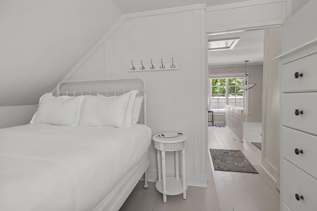 Bedroom 4 is on the upper level & has a queen-size bed.