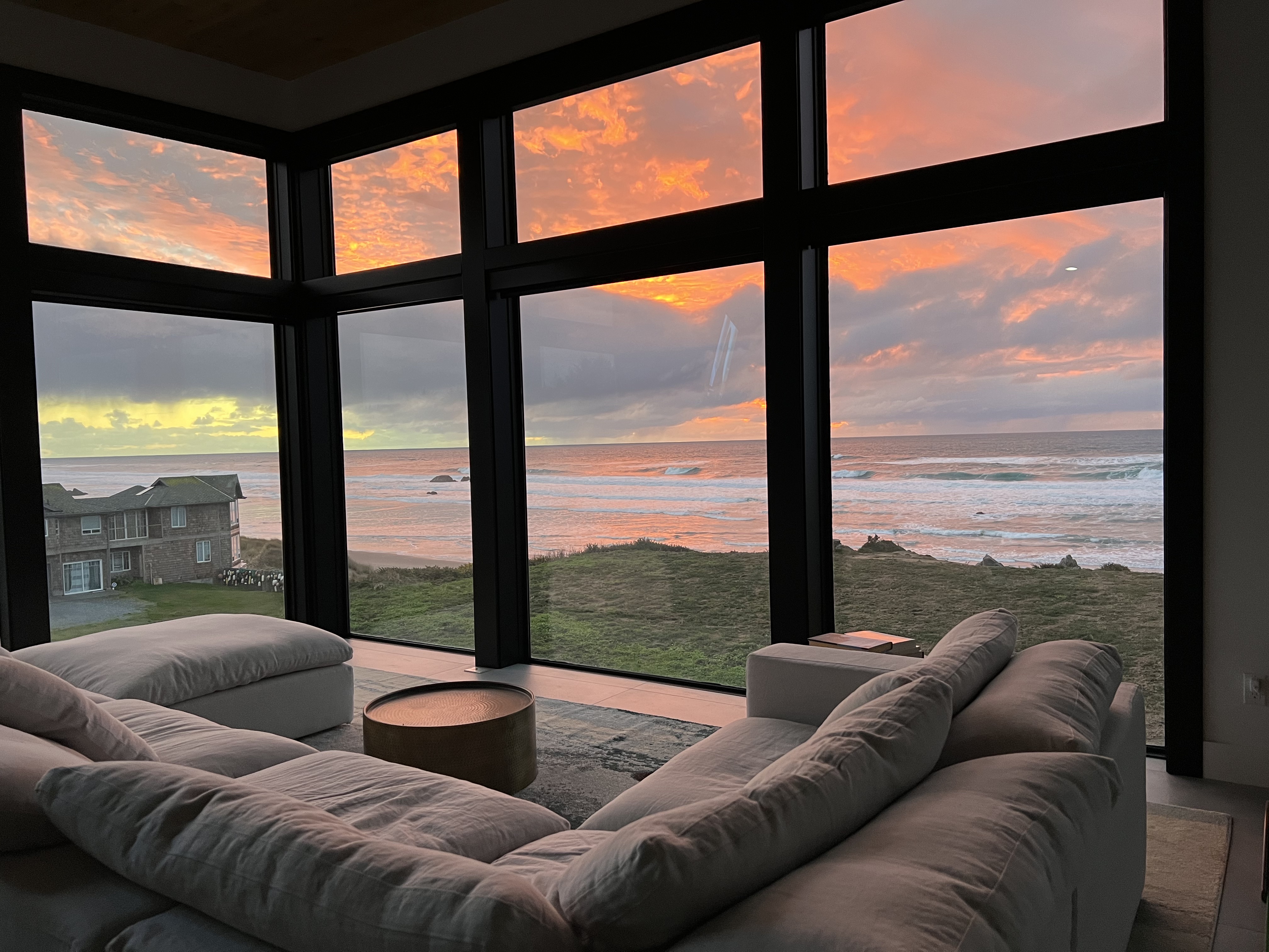 Floor-to-ceiling windows all through the home allow for breath taking ocean views