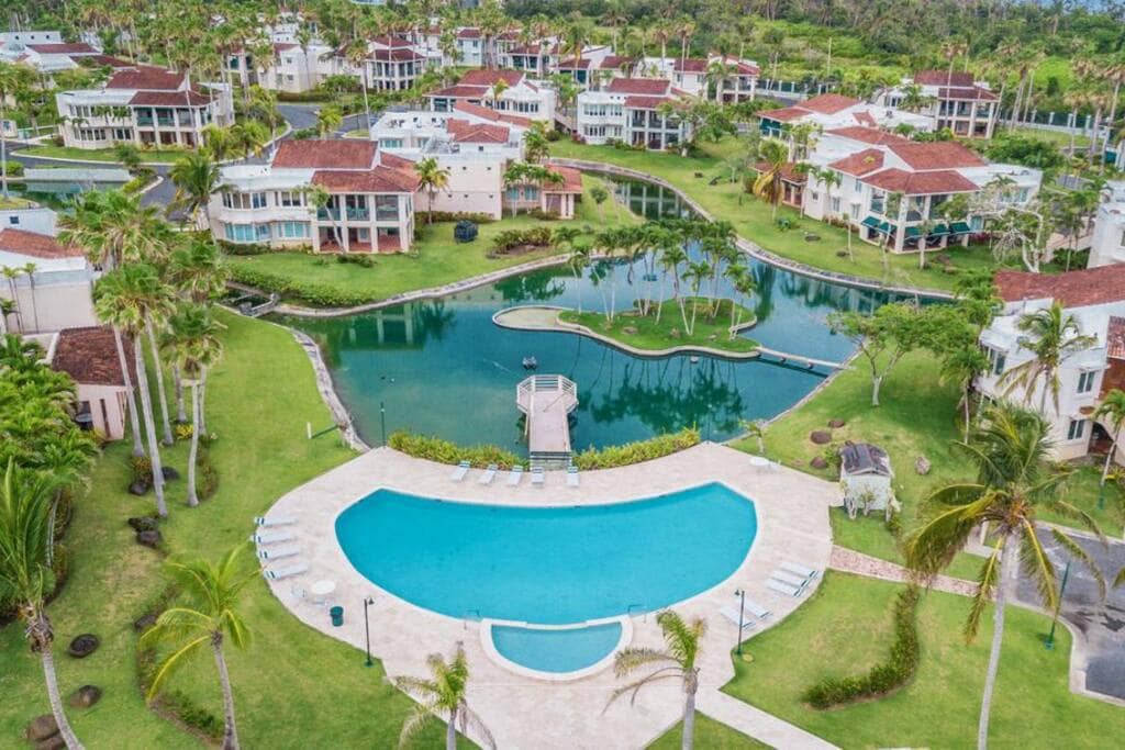 Spacious villas in a Beachfront community - with three pools, magical gardens, Club house, game area, fitness room, tennis and more!  We manage multiple villas in the community so we can even accommodate groups of up to 60 guests!