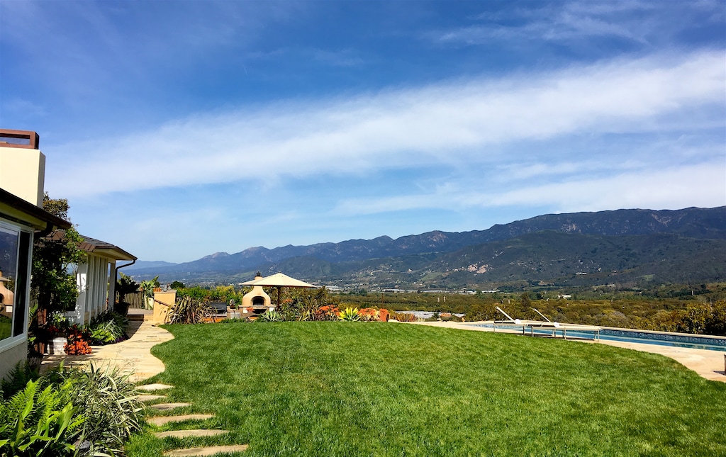 Steps lead back to the tennis court and Guest House