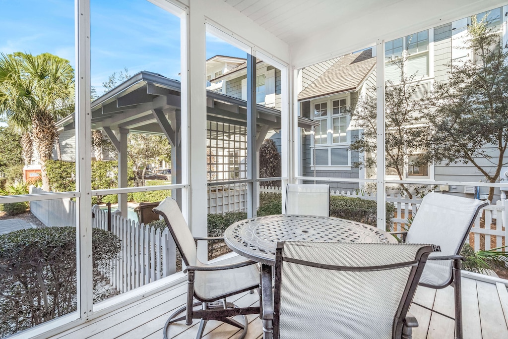 Screened in front porch with table for 4
