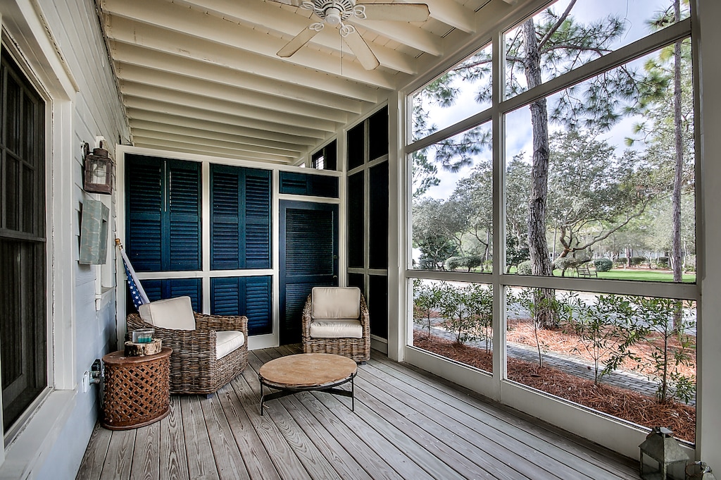 Screened-in front porch overlooks Cerulean Park