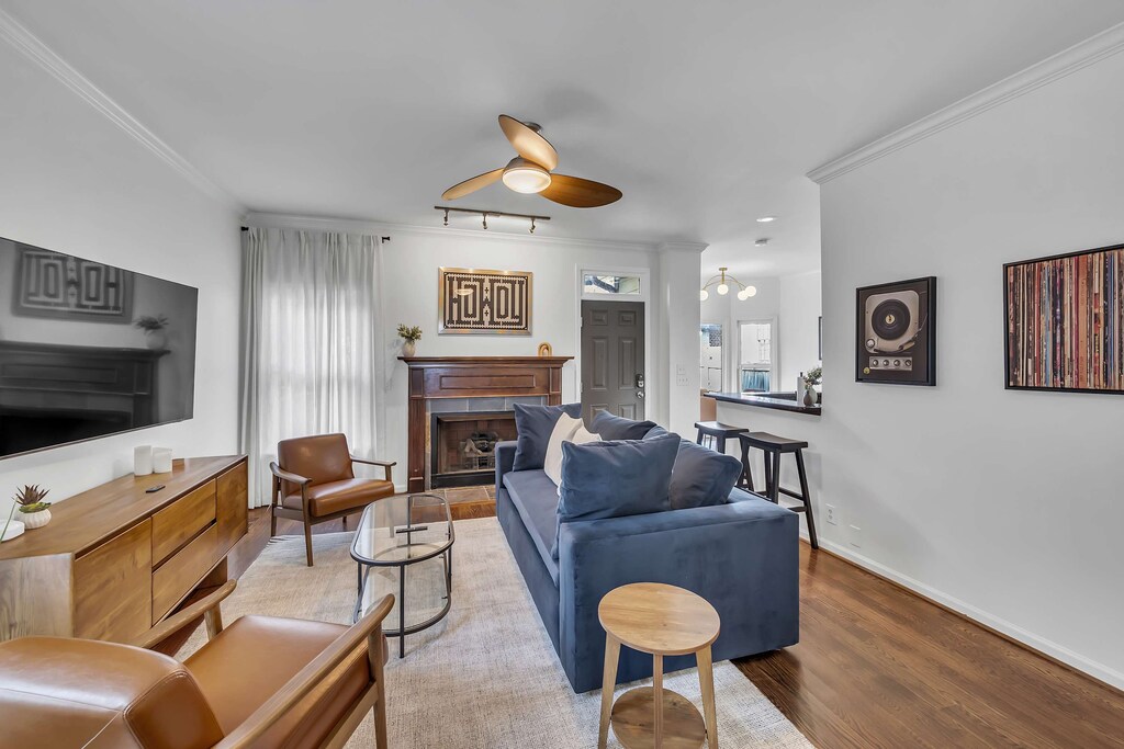 The living area is flooded with natural light, creating a warm and welcoming open space.