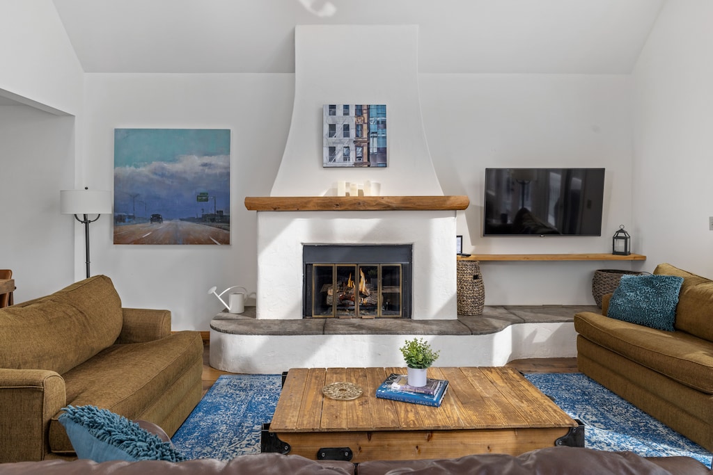 Open concept living room, dining room, and kitchen