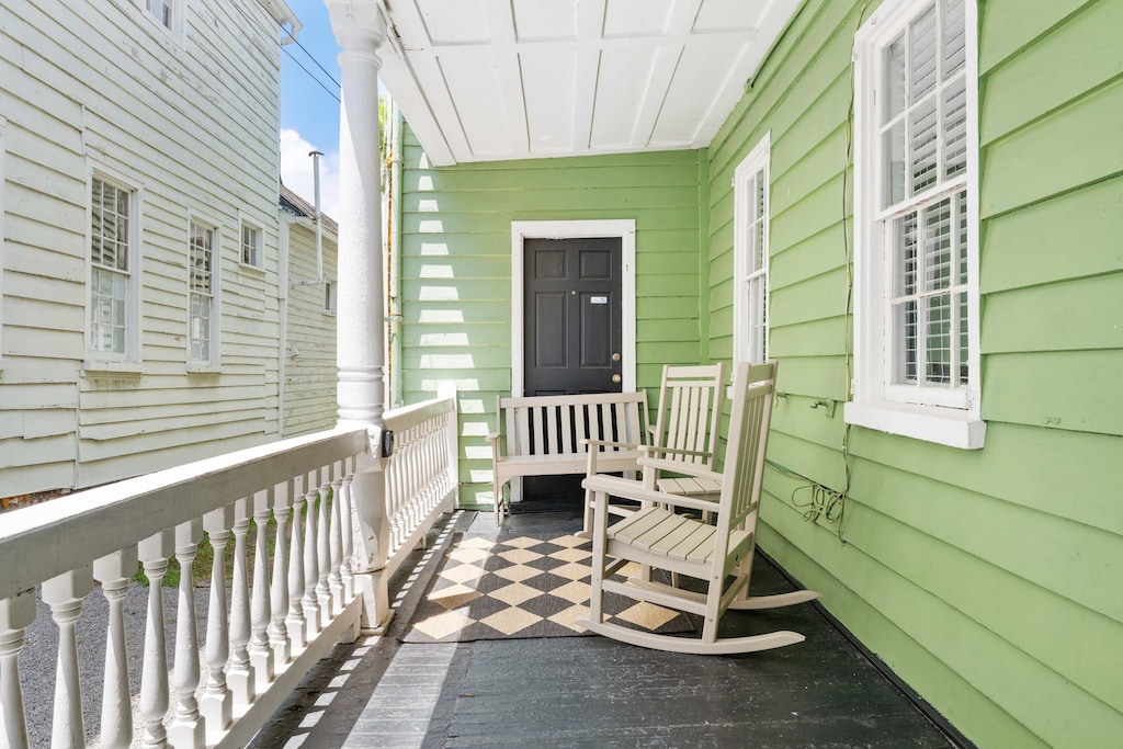 Charleston porch with seating for your group 