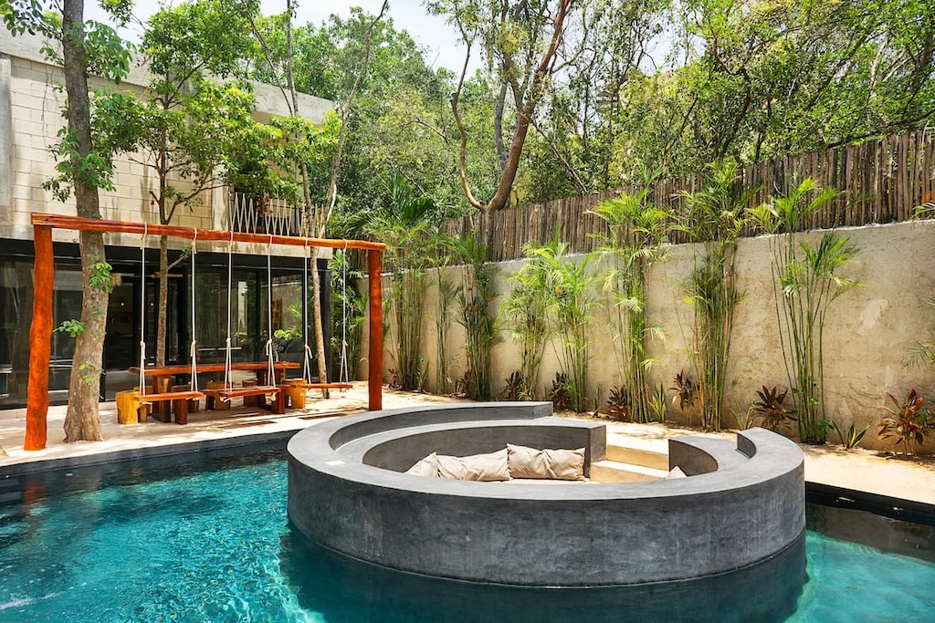 Enjoy the sun in this beautiful pool with lounge area