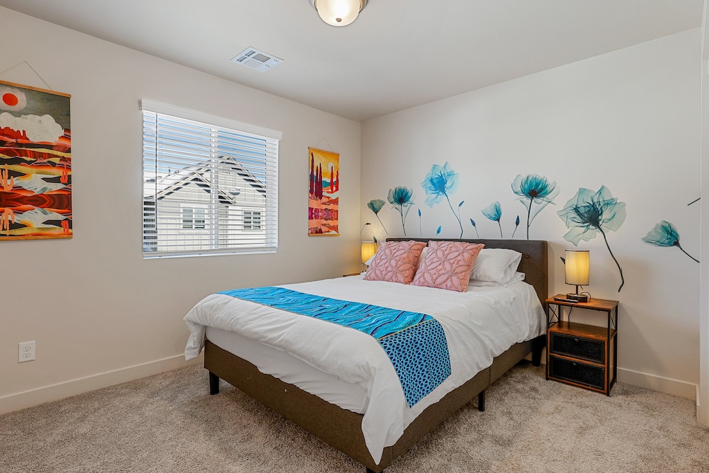 The second bedroom is beautifully equipped with a queen size Nectar foam mattress, a 75" SMART TV, and spacious closet.