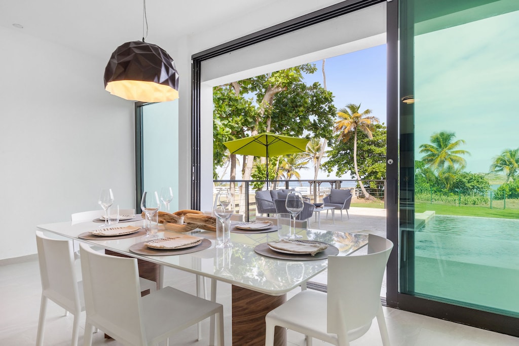 The stunning dining room offers seating for 6 guests and spectacular views.