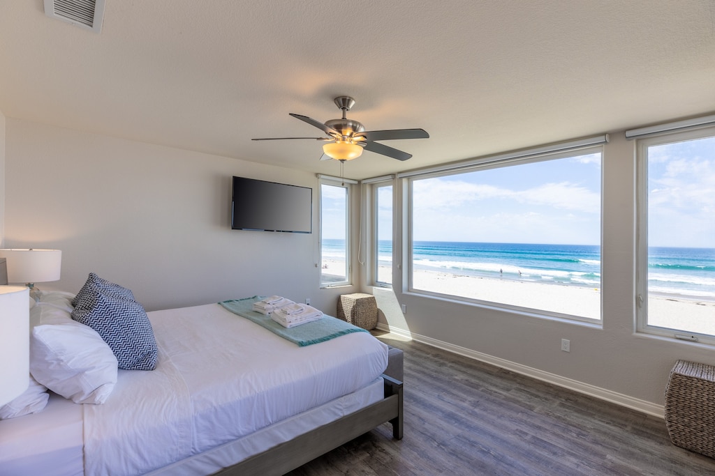 Primary suite with king bed & TV