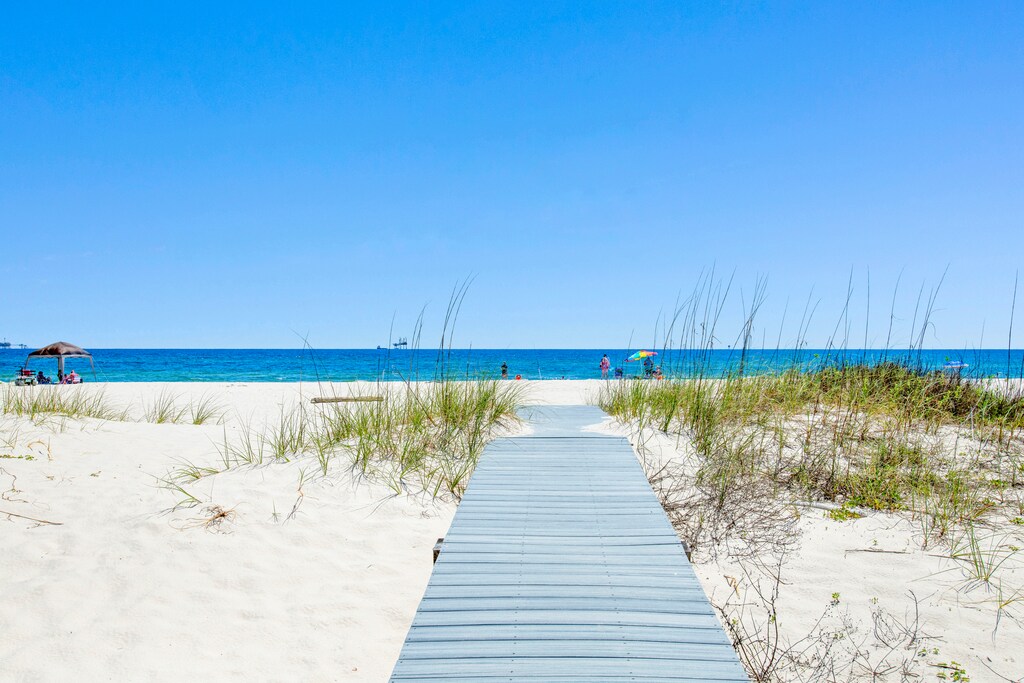 With a private boardwalk leading you to the beach