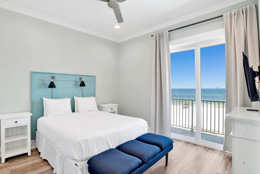 Guest bedroom, located on the 2nd floor with a private bathroom, Queen bed, TV and balcony access