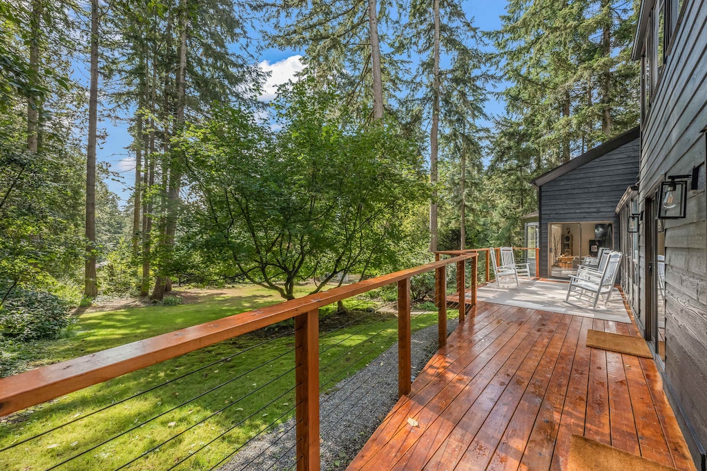 Breathe in the fresh air and take in the serene views of nature from our expansive deck.