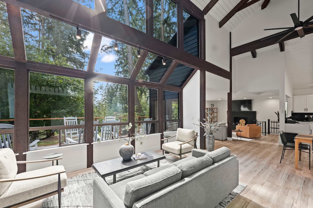 Our living room’s skylight windows invite the beauty of the outdoors inside, filling the space with sunlight.