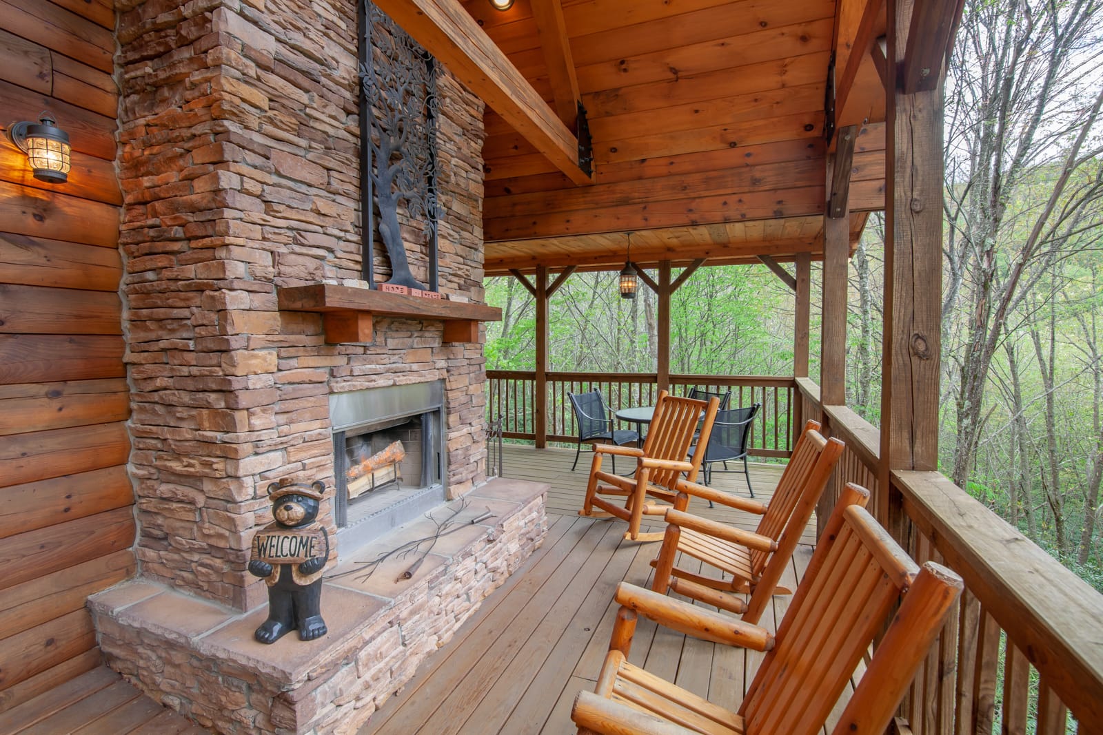 Covered Porch with Stacked Stone Wood-Burning Outdoor Fireplace