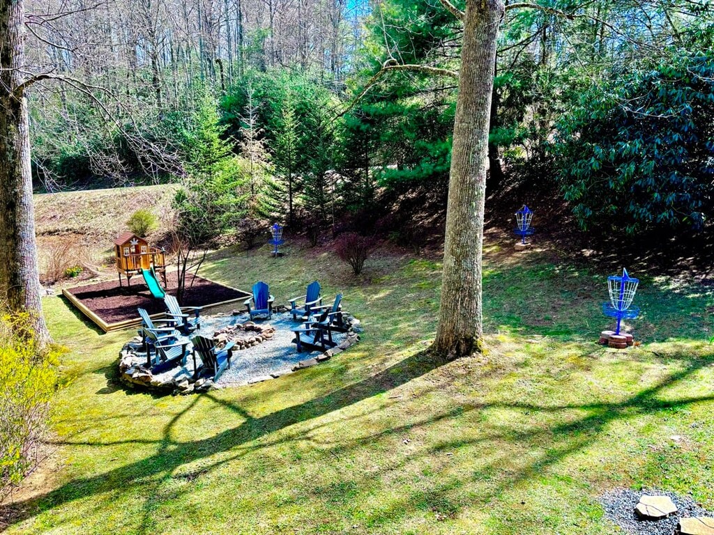 Fire Pit, Mini Disc Golf Practice Course, and Kids Kamp Lookout (outdoor playhouse) in the Spacious Backyard