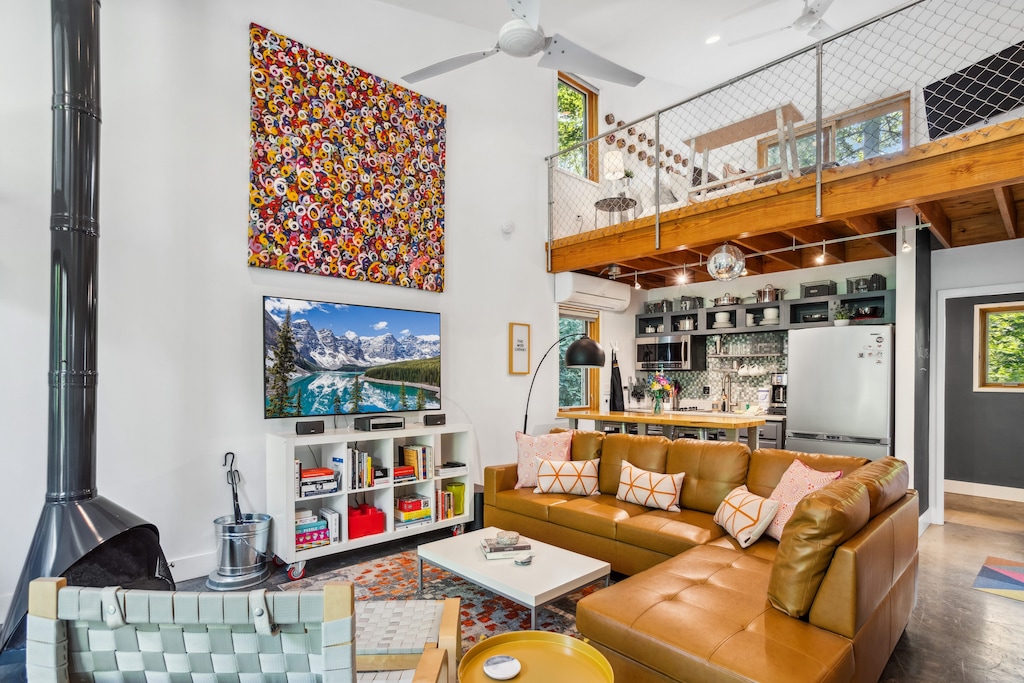 Wood-Burning Fireplace and Spacious Sectional in the Living Room