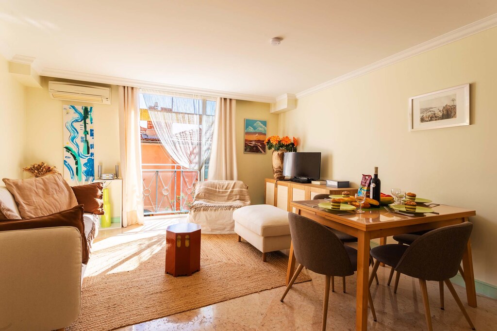 Bright space with a cozy living area, elegant dining table, and refined decor. Perfect for relaxing and enjoying quality time.