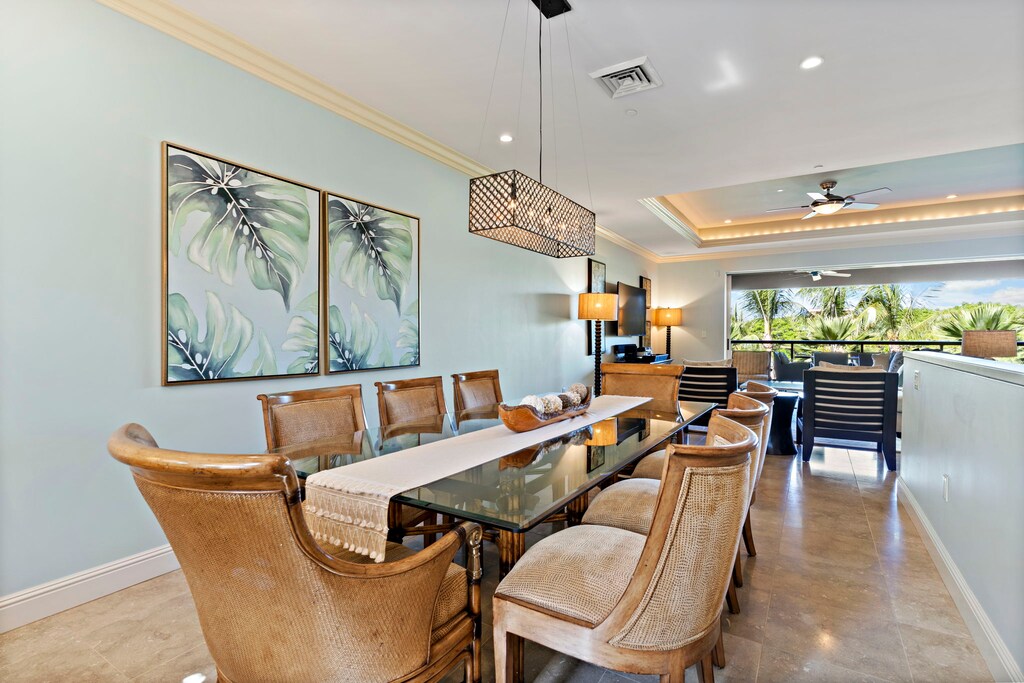 The formal dining area at Wailea Hoolei 93-3 comfortably seats eight, perfect for gatherings.