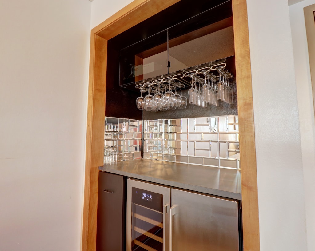 Wine bar area next to dining room table.