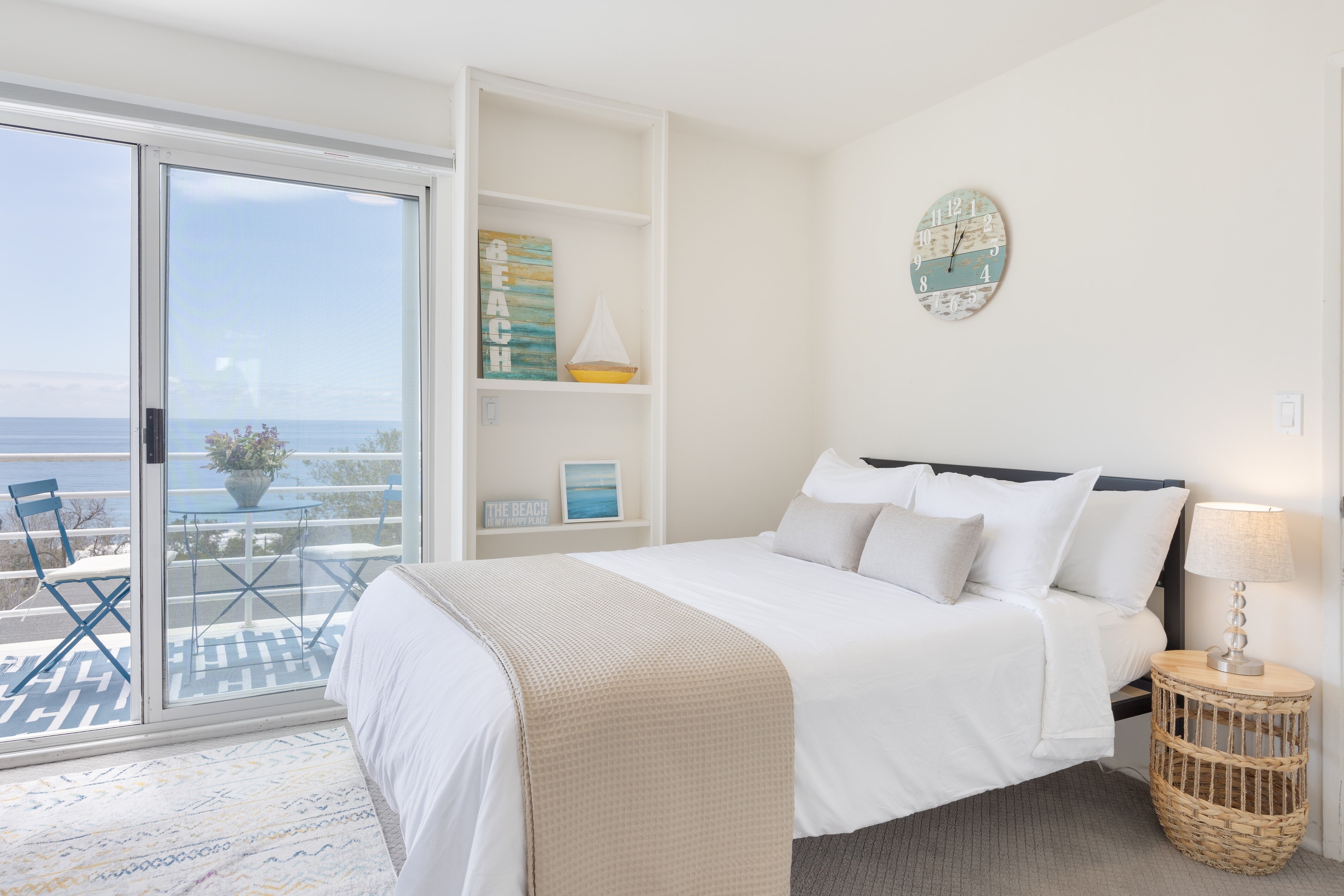 Bedroom 3 features a queen bed, a private balcony, and a working space table.