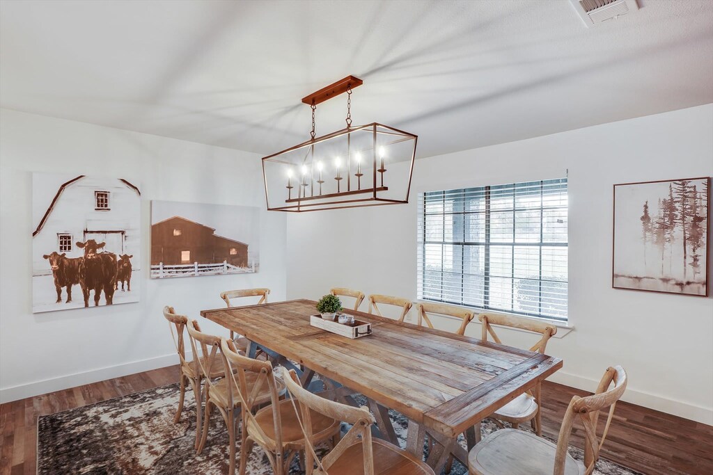 Embracing the beauty of natural wood, there’s more than enough seating for up to 10 guests here when the dinner bell is rung!