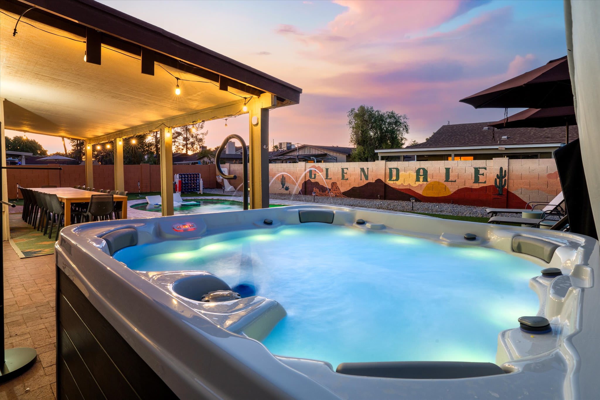 Unwind in the glow of the night! Our hot tub is ready for a relaxing evening soak