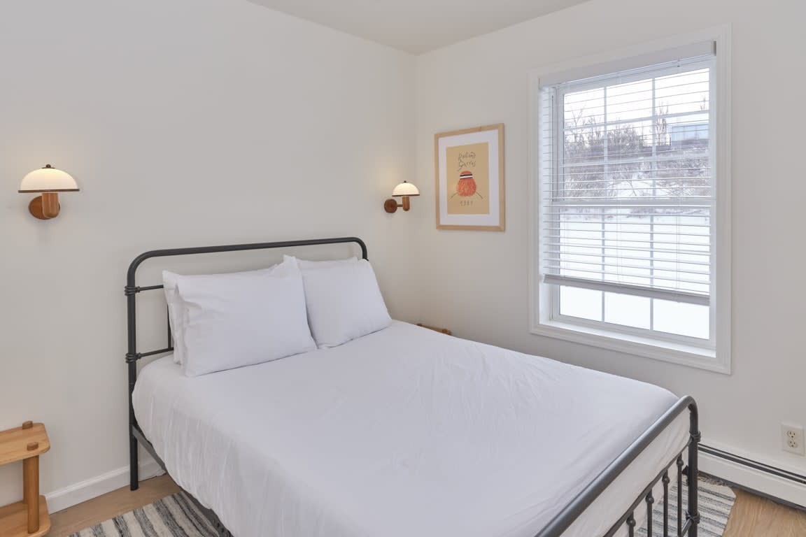 Bedroom 3 features a queen bed.