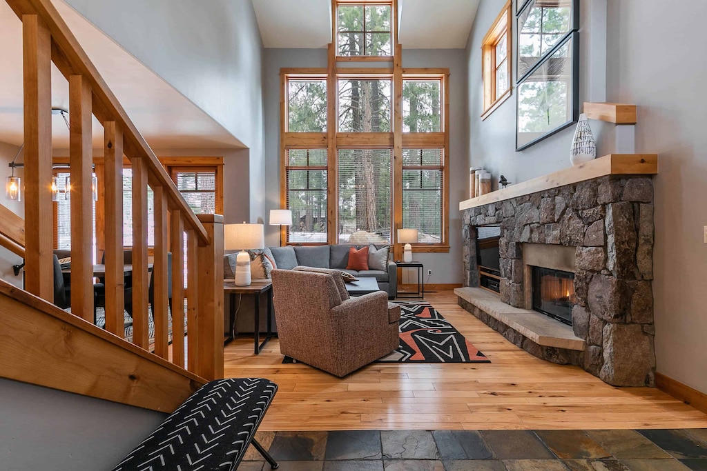Vaulted ceilings and a spacious floor plan give way to soaring windows and tranquil, wooded views.