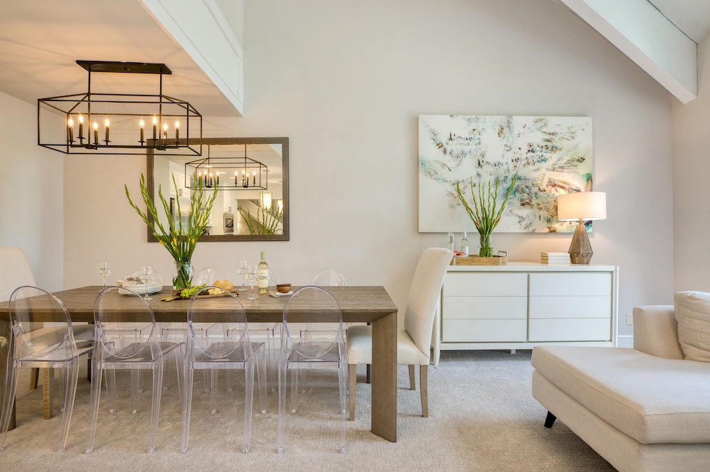 Elegant dining area with trendy acrylic seating.