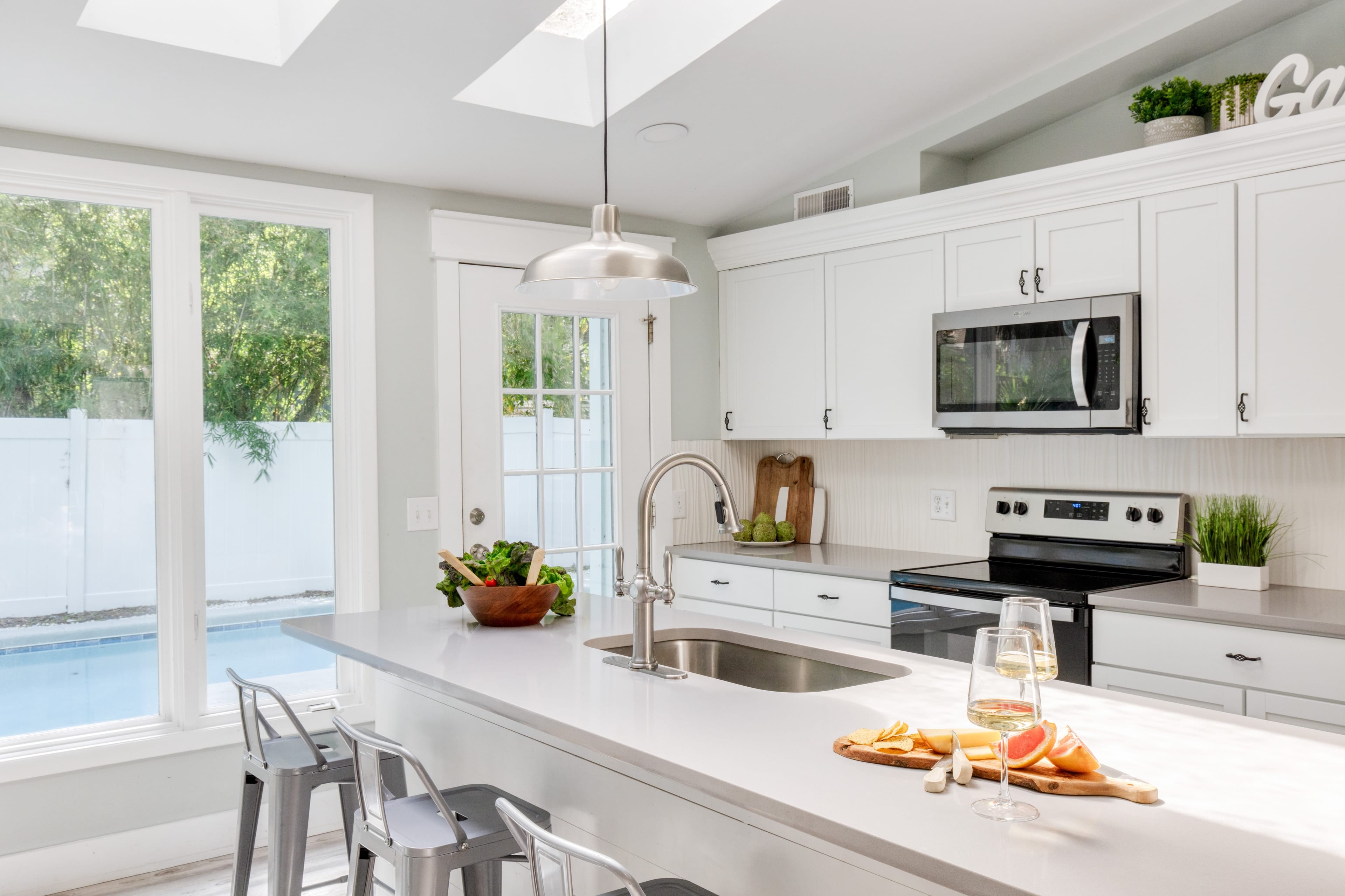 Fully equipped kitchen with modern appliances.